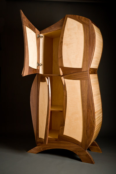 sculptural custom enterainment center or wood armoire