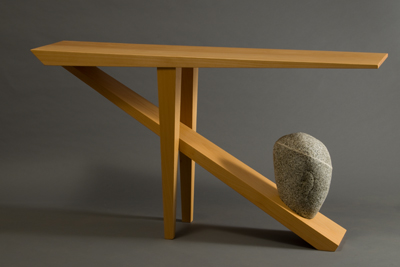 Custom sculptural stone and wood hall table by furniture maker Seth Rolland