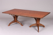 custom expanding dining table made from Walnut and bubinga
