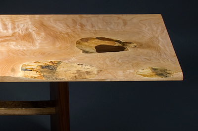 Detail of Holey Maple hall table made from bigleaf maple and walnut by furniture maker Seth Rolland