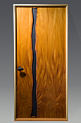 Slate and Mahogany door hand carved and finished by furniture maker Seth Rolland