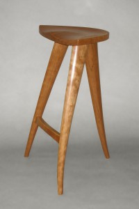 three leg custom wood drafting stool with carved seat by Seth Rolland furniture design