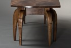 End view of Octoped solid walnut coffee table designed and hand carved by Seth Rolland custom furniture