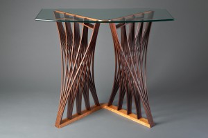 second side of walnut wood Parabola display table for hall, entry or console by Seth Rolland custom furniture design