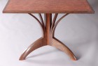 curved organic tree base dining table with walnut and bubinga by Seth Rolland custom furniture design studio