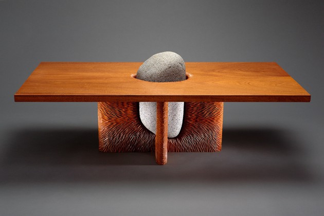Tsubo coffee table made from mahogany wood and granite stone with hand carved base by Seth Rolland custom furniture design