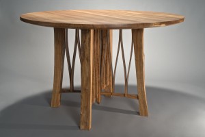 Contemporary solid wood round dining table by Seth Rolland fine furniture
